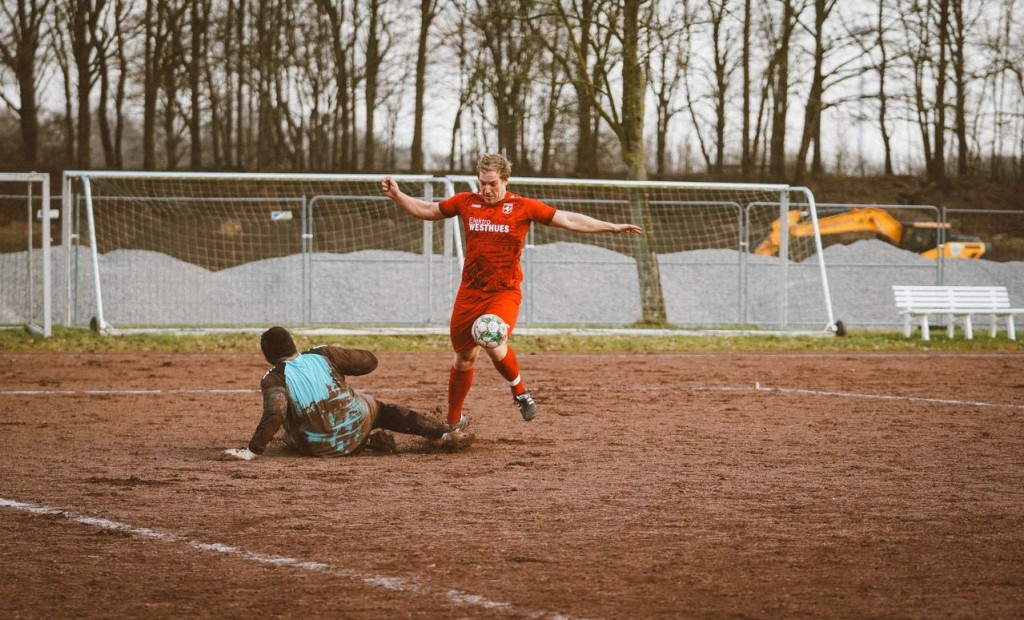 football in mud